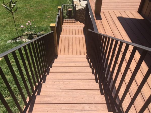 Trex Tiki Torch looks fantastic with black wrought iron