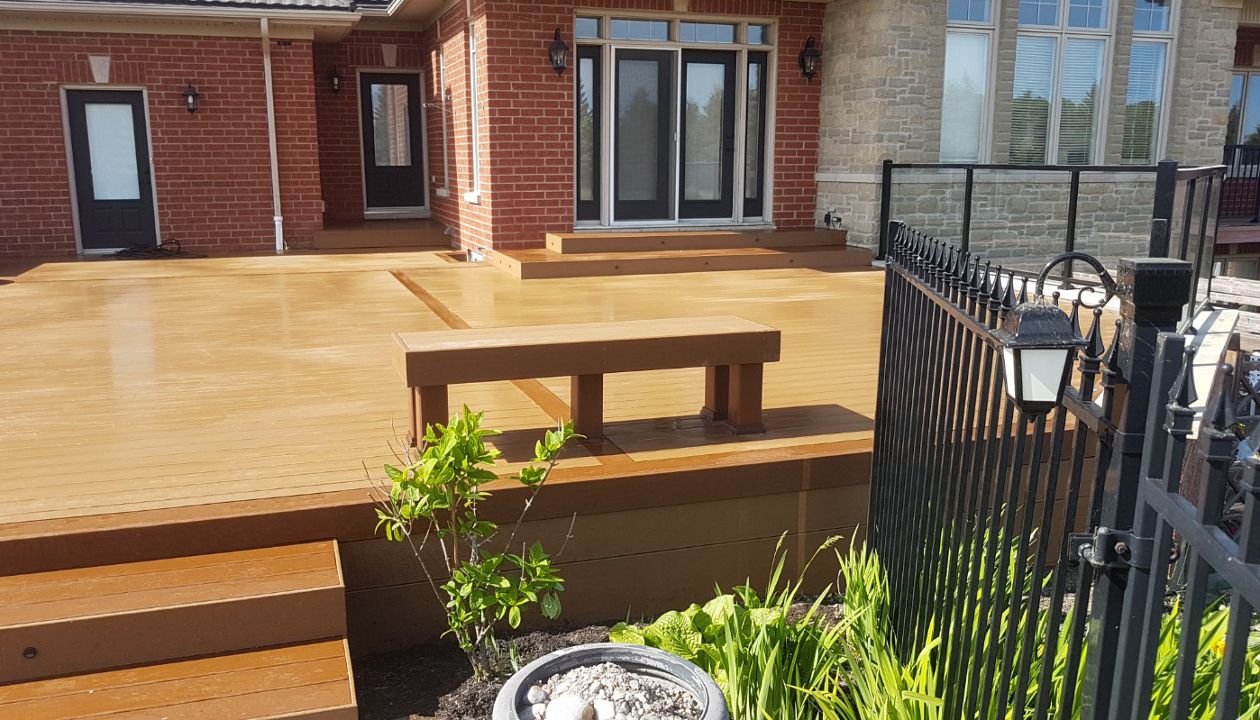 Main: Trex Enhance Basics in Beach Dune. Trim: Trex Enhance Basics in Saddle. Contact Align Decking today for your custom composite decking needs. Servicing Durham Region, Kawartha Lakes, and the Barrie & Orillia areas.