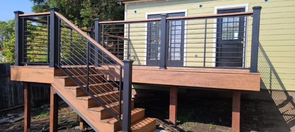 Trex Elevations, Transcend Tropicals Tiki Torch 12 x16, Signature Railing Charcoal Black Aluminum, Cocktail Railing, Richmond CA. Prior to the finishing touches