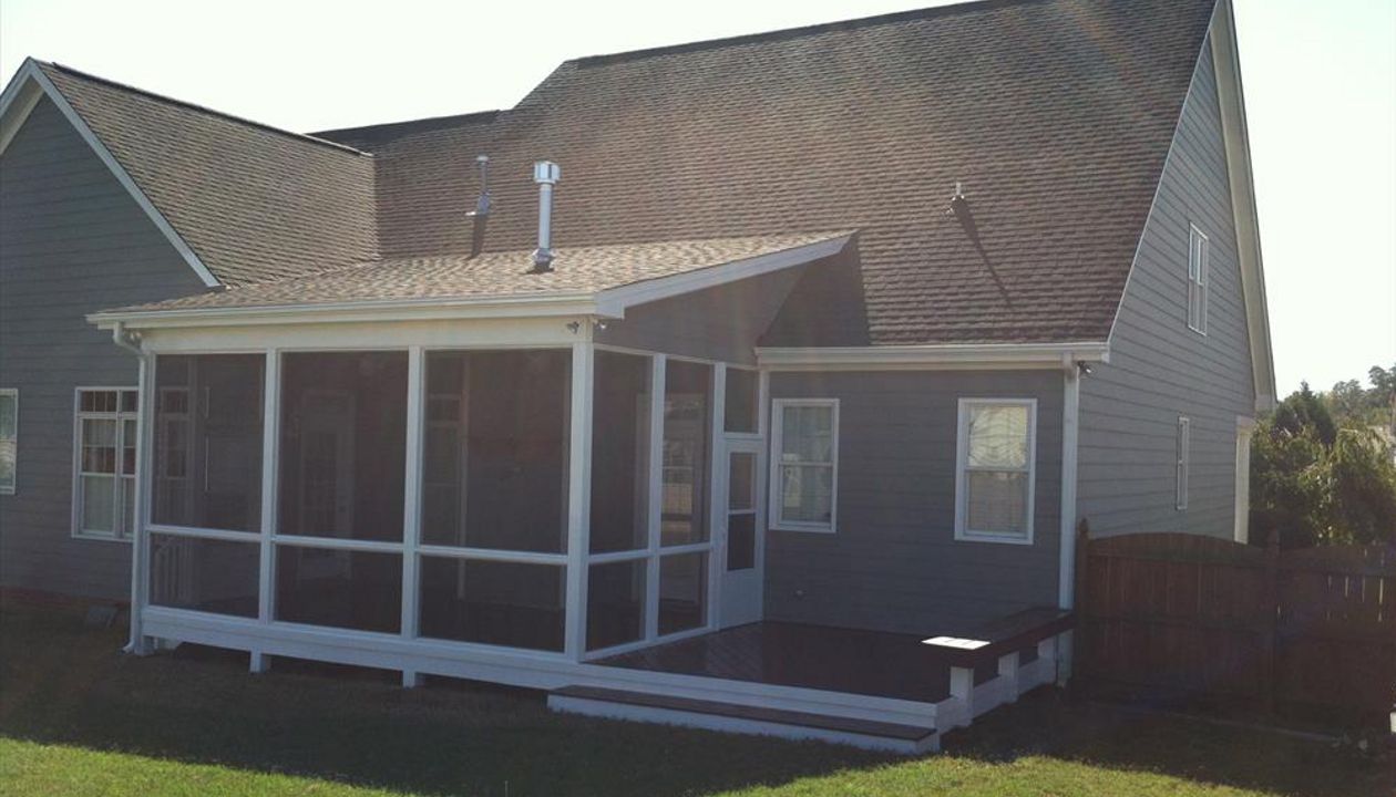 Trex Select was used to dress up this porch and deck addition.  Notice as well the custom bench using matching Trex decking.