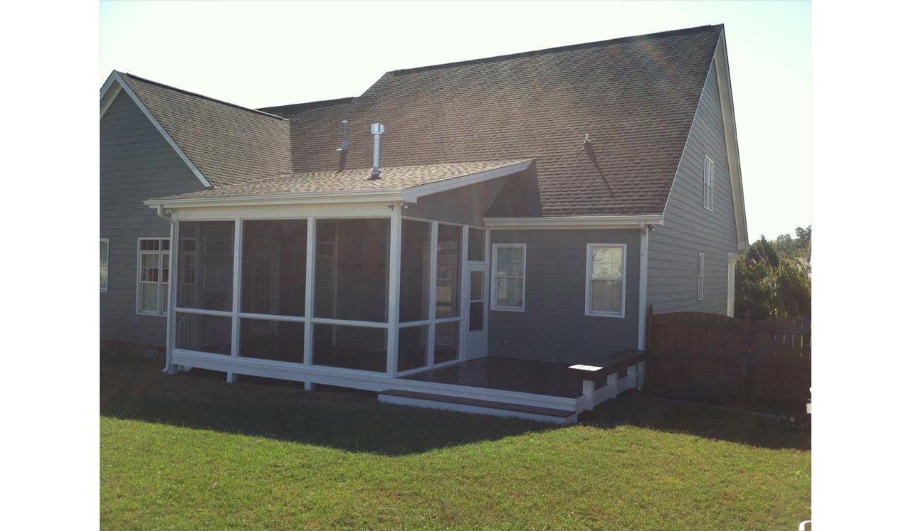 Trex Select was used to dress up this porch and deck addition.  Notice as well the custom bench using matching Trex decking.