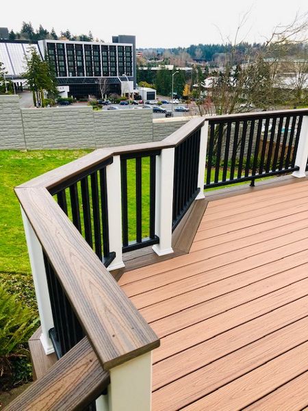 Trex Transcend Tiki Torch body w/ Spice rum boarder. Transcend railing w/ cocktail top cap and rain escape