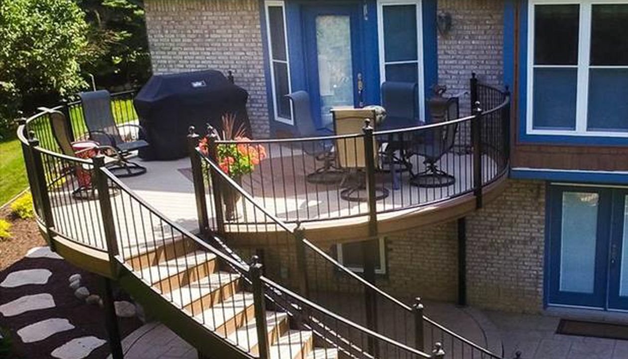 This Trex deck located in Plymouth, MI has Trex enhanced beach dune decking with saddle inlay. The foundation is composed of Goliath Tech helical piers.