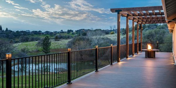 Spiced Rum Decking and rough redwood pergola
