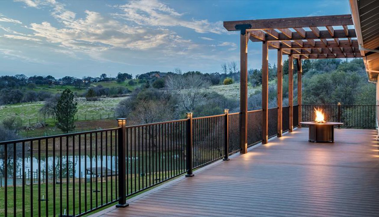 Spiced Rum Decking and rough redwood pergola