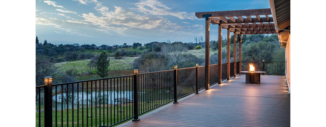 Spiced Rum Decking and rough redwood pergola