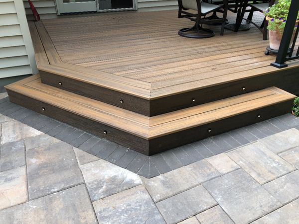 Create a beautiful outdoor space with Trex Transcend Havana Gold decking and Trex Transcend Spiced Rum Fascia with Trex LED stair riser lighting