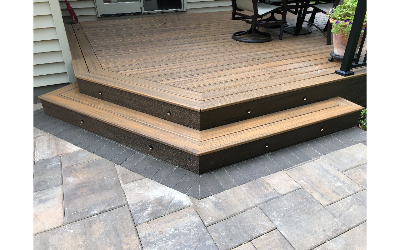 Create a beautiful outdoor space with Trex Transcend Havana Gold decking and Trex Transcend Spiced Rum Fascia with Trex LED stair riser lighting