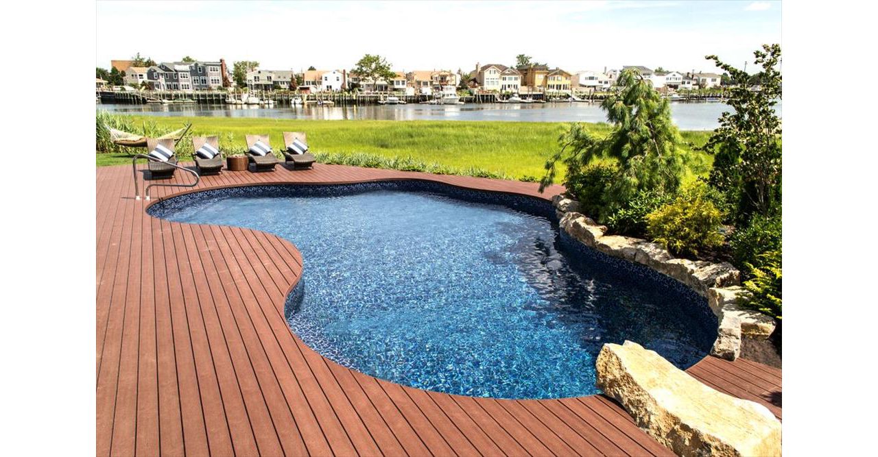 Free formed pool with Trex decking
