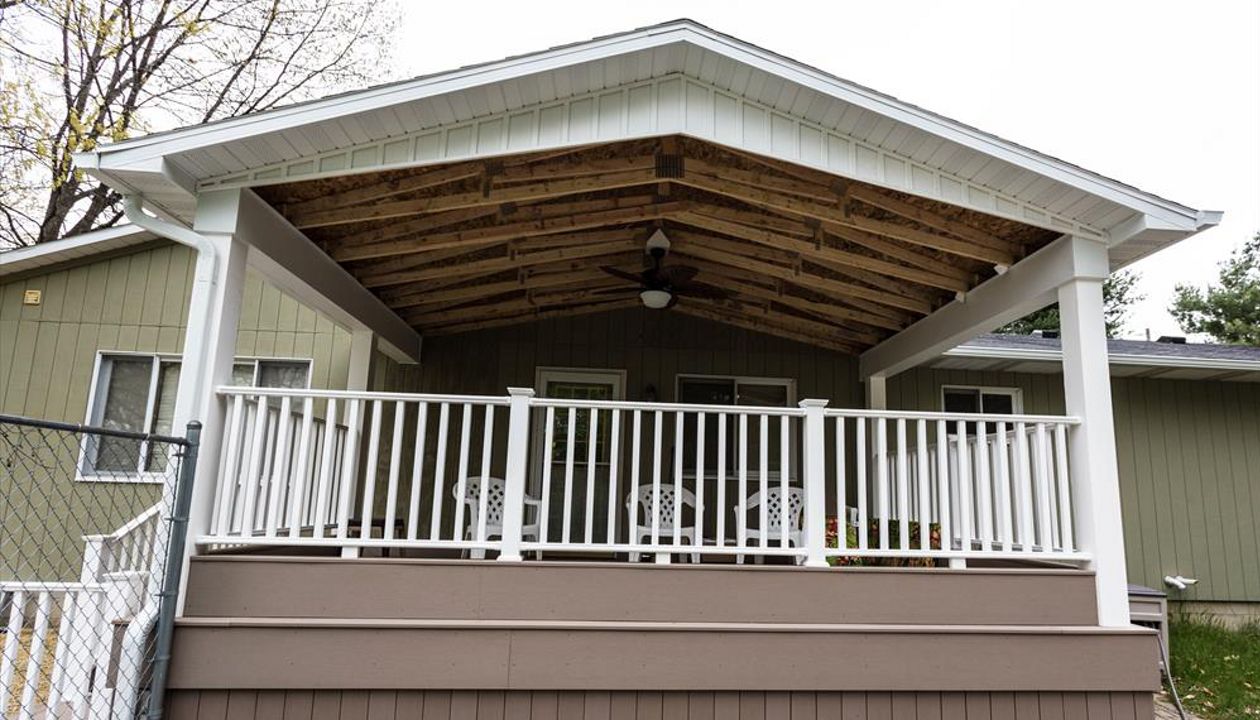 Here we built a new deck as well as a roof overhead to enjoy even in the rain!