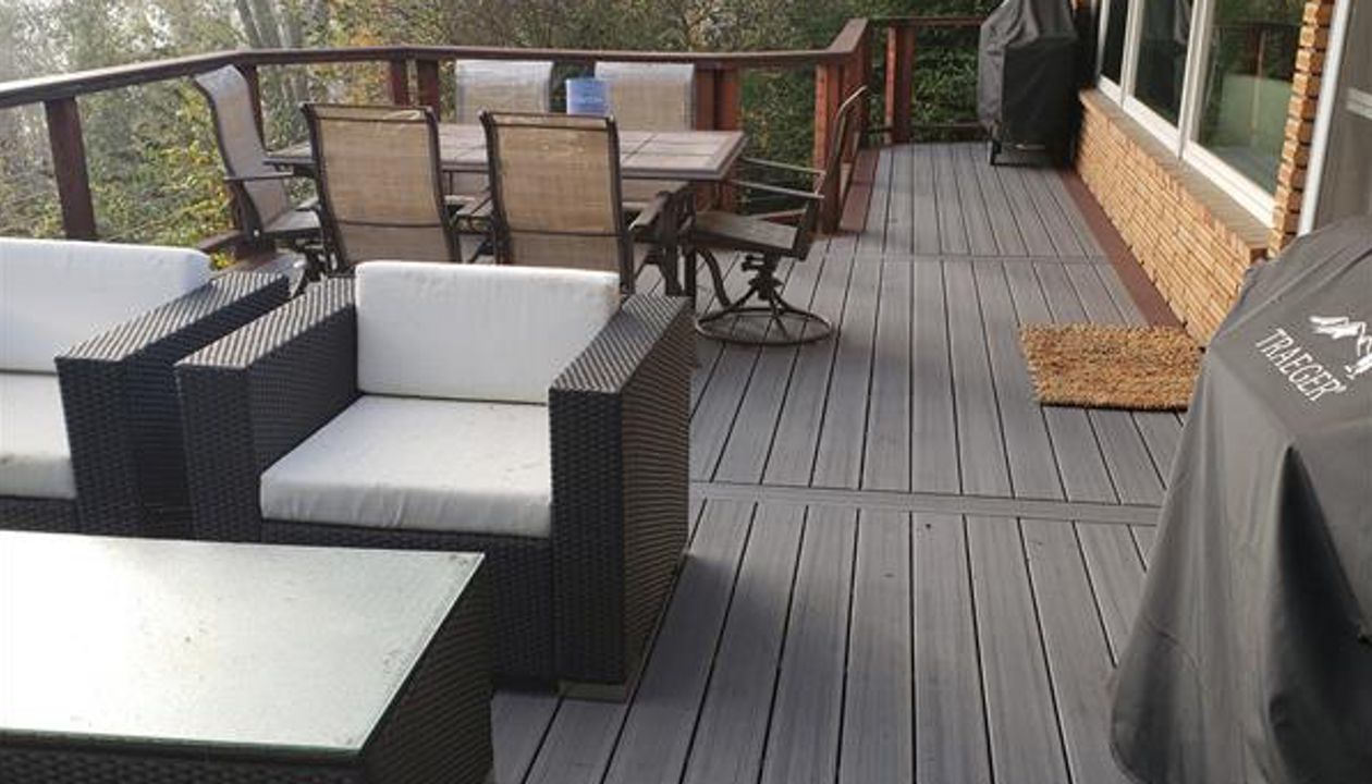 Trex Contour Chateau Grey with cedar cable rails.