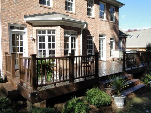 Trex Transcend Lava Rock compliments this brick home