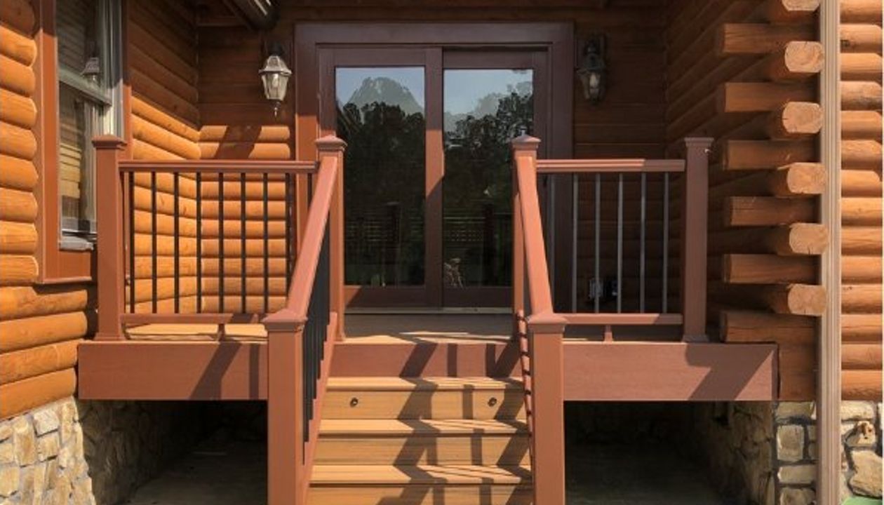 Trex Transcend Havana Gold side porch with Transcend Fire Pit Railing and Fascia