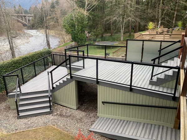 Island Mist field, bordering, risers, and fascia. Lighting package, and aluminum railings.