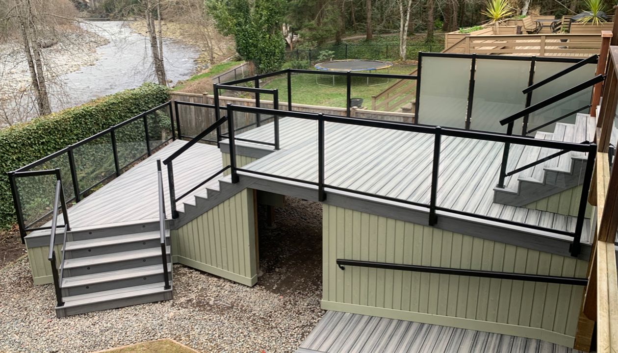 Island Mist field, bordering, risers, and fascia. Lighting package, and aluminum railings.