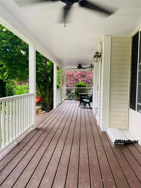 Vintage lantern farmers porch with Transcend railings