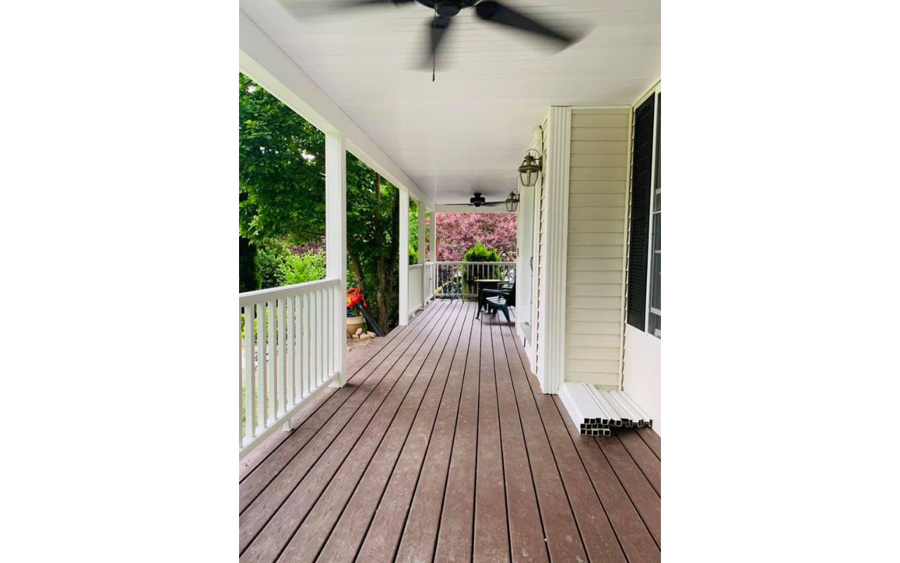 Vintage lantern farmers porch with Transcend railings