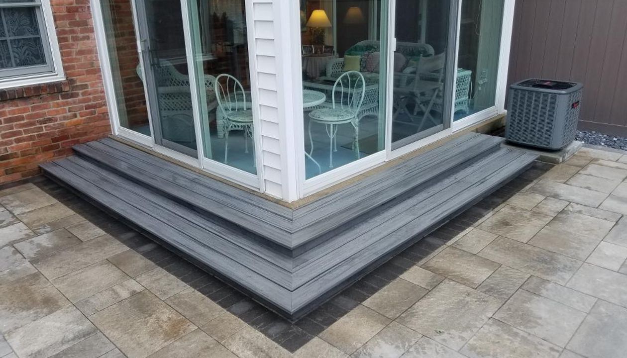 Custom Trex step in Island Mist for new patio in Grosse Pointe, MI