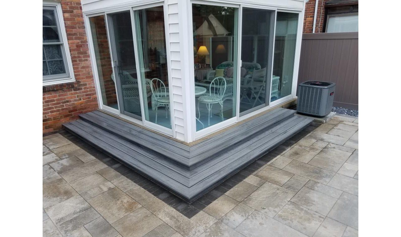 Custom Trex step in Island Mist for new patio in Grosse Pointe, MI