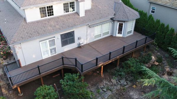 Trex Spiced Rum Decking with Black Trex Signature railing in Happy Valley, OR.