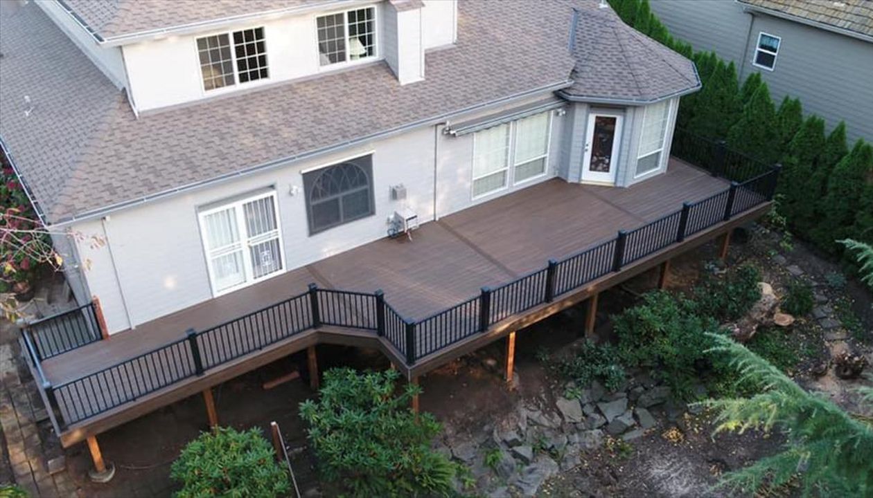 Trex Spiced Rum Decking with Black Trex Signature railing in Happy Valley, OR.