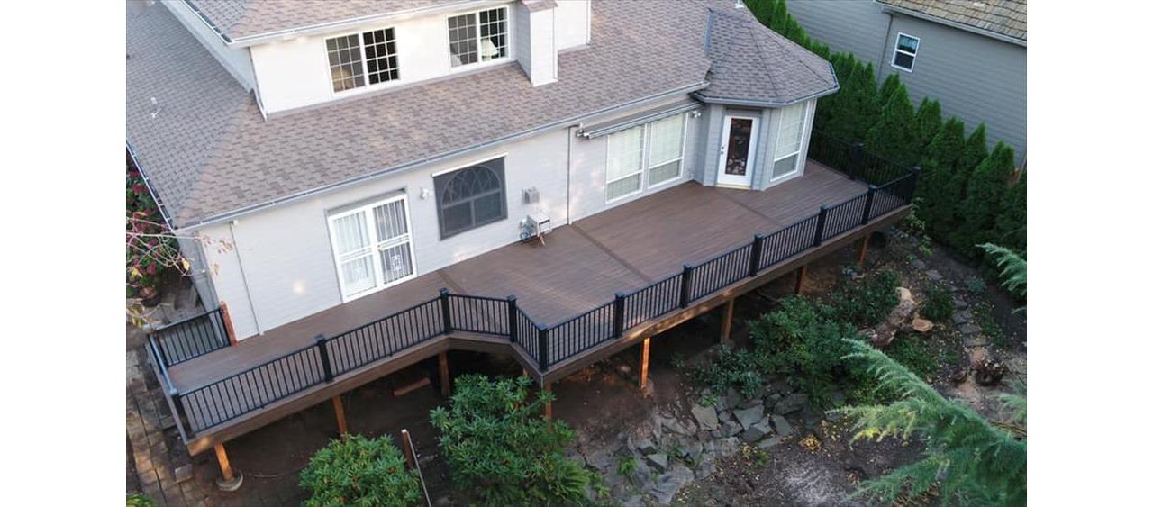 Trex Spiced Rum Decking with Black Trex Signature railing in Happy Valley, OR.