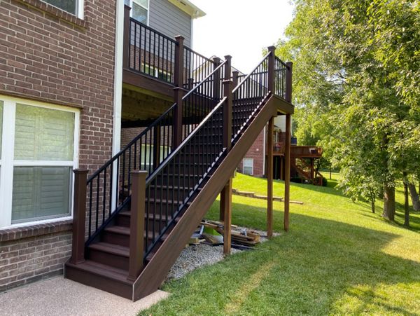 Trex Transcend (Spiced Rum) Decking with Matching Fascia. Trex Signature Aluminum Rail with Trex Composite Posts.