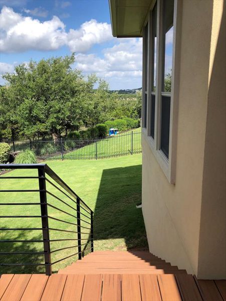 Custom Trex Transcend Tiki Torch composite deck by Austin Deck Company, Austin, TX