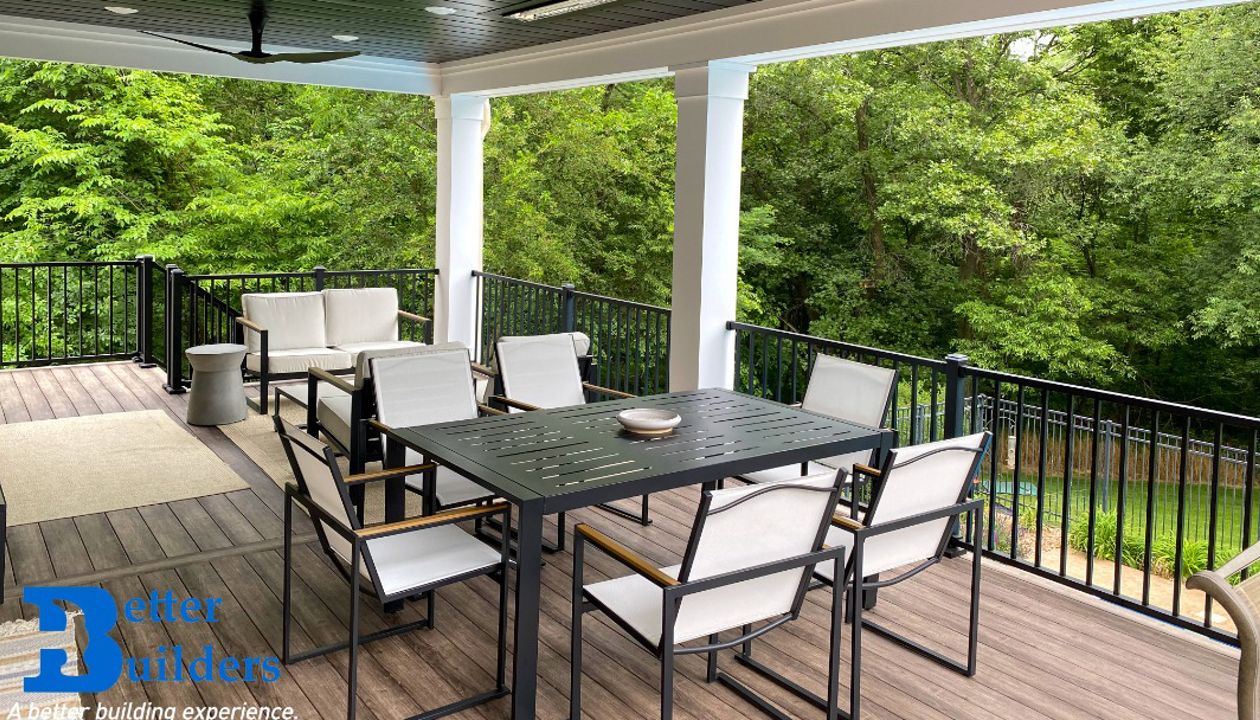 Signature railing, lighting, and Trex Rain Escape - Better Builders of Iowa - Covered deck project in Waukee, IA