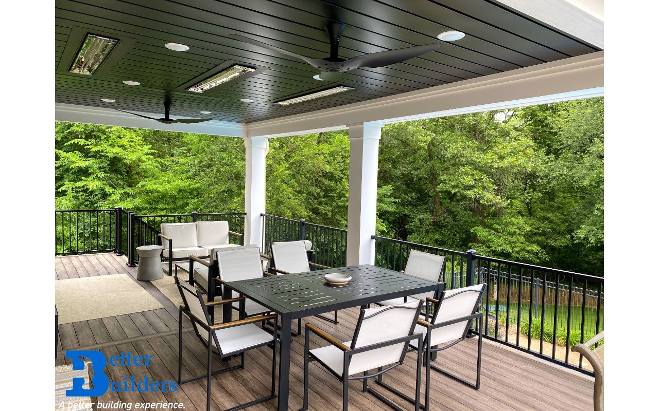 Signature railing, lighting, and Trex Rain Escape - Better Builders of Iowa - Covered deck project in Waukee, IA