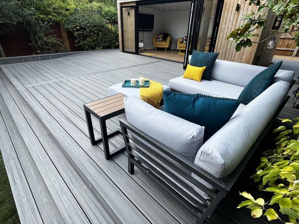Trex transcend island mist decking, picture framed with a breaker board through the main field. Wheel chair access ramp with a full width steps with fascia lighting. Location Ipswich, Suffolk