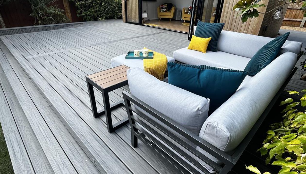 Trex transcend island mist decking, picture framed with a breaker board through the main field. Wheel chair access ramp with a full width steps with fascia lighting. Location Ipswich, Suffolk