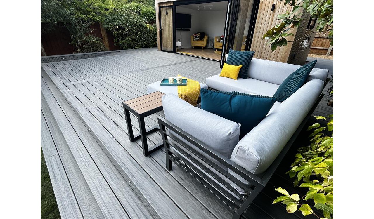 Trex transcend island mist decking, picture framed with a breaker board through the main field. Wheel chair access ramp with a full width steps with fascia lighting. Location Ipswich, Suffolk