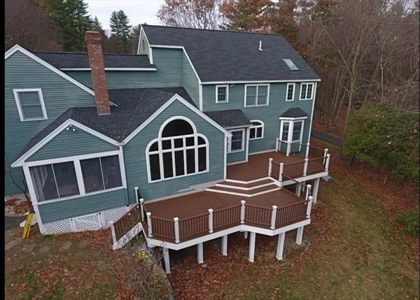 Select Saddle Decking, Transcend Tree House Railing with Black Round Balusters, Trex Low Voltage Lighting