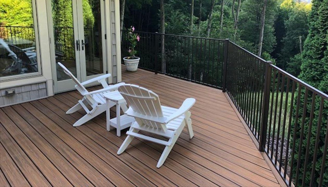 This Trex Transcend deck includes a Trex Elevations framing system & Trex RainEscape drainage system to make a low-maintenance, lasting & dry environment!