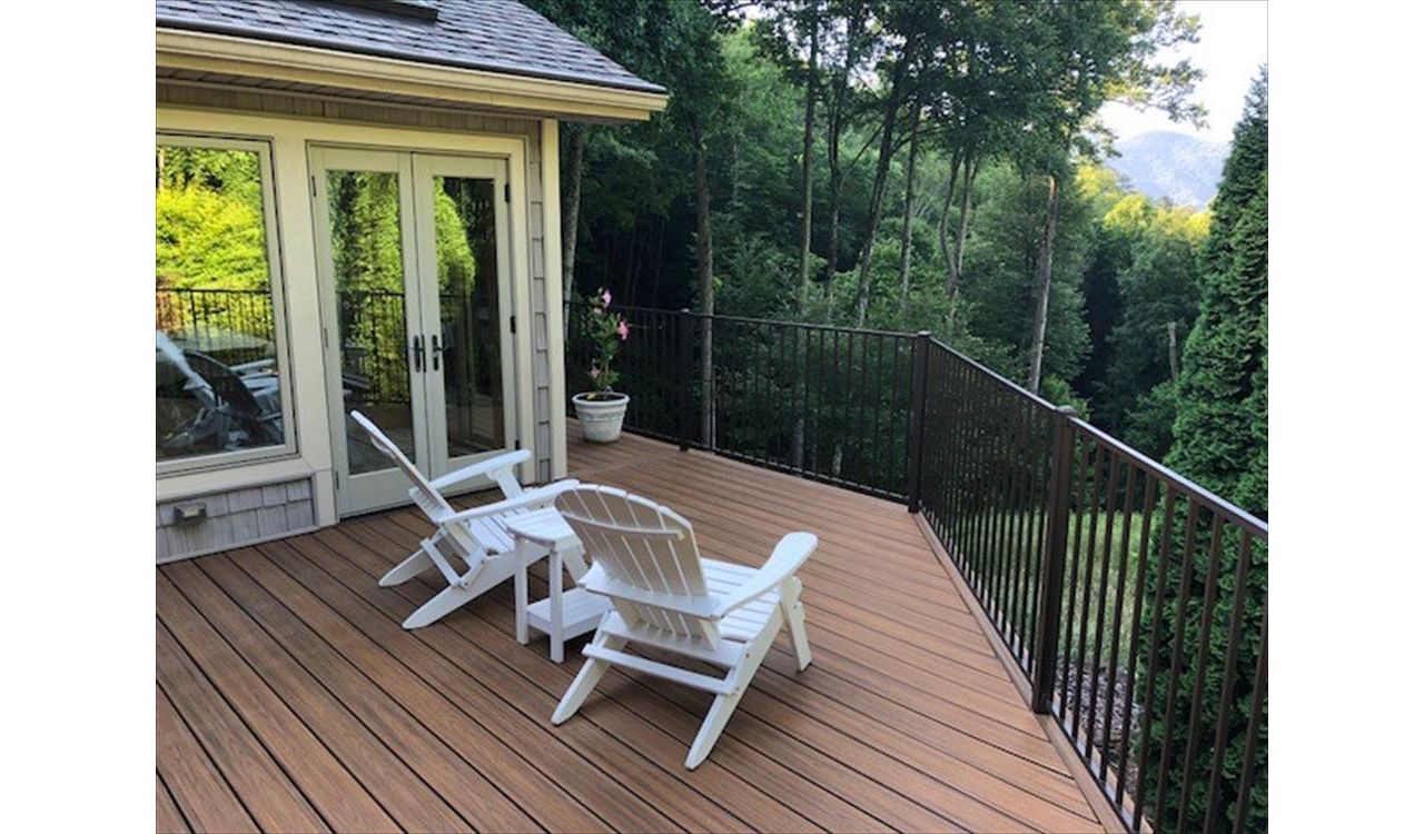 This Trex Transcend deck includes a Trex Elevations framing system & Trex RainEscape drainage system to make a low-maintenance, lasting & dry environment!