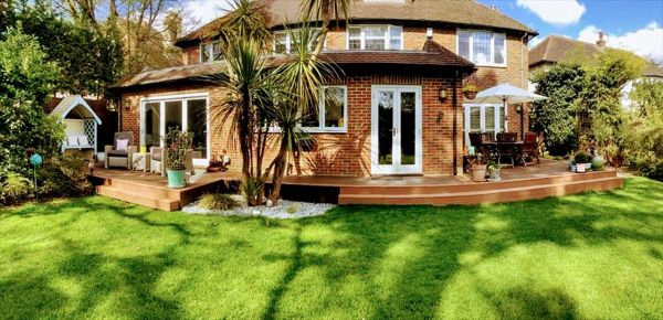 Trex Transcend Tiki Torch and Trex Transcend Spiced Rum Decking in Walton on Thames , England UK