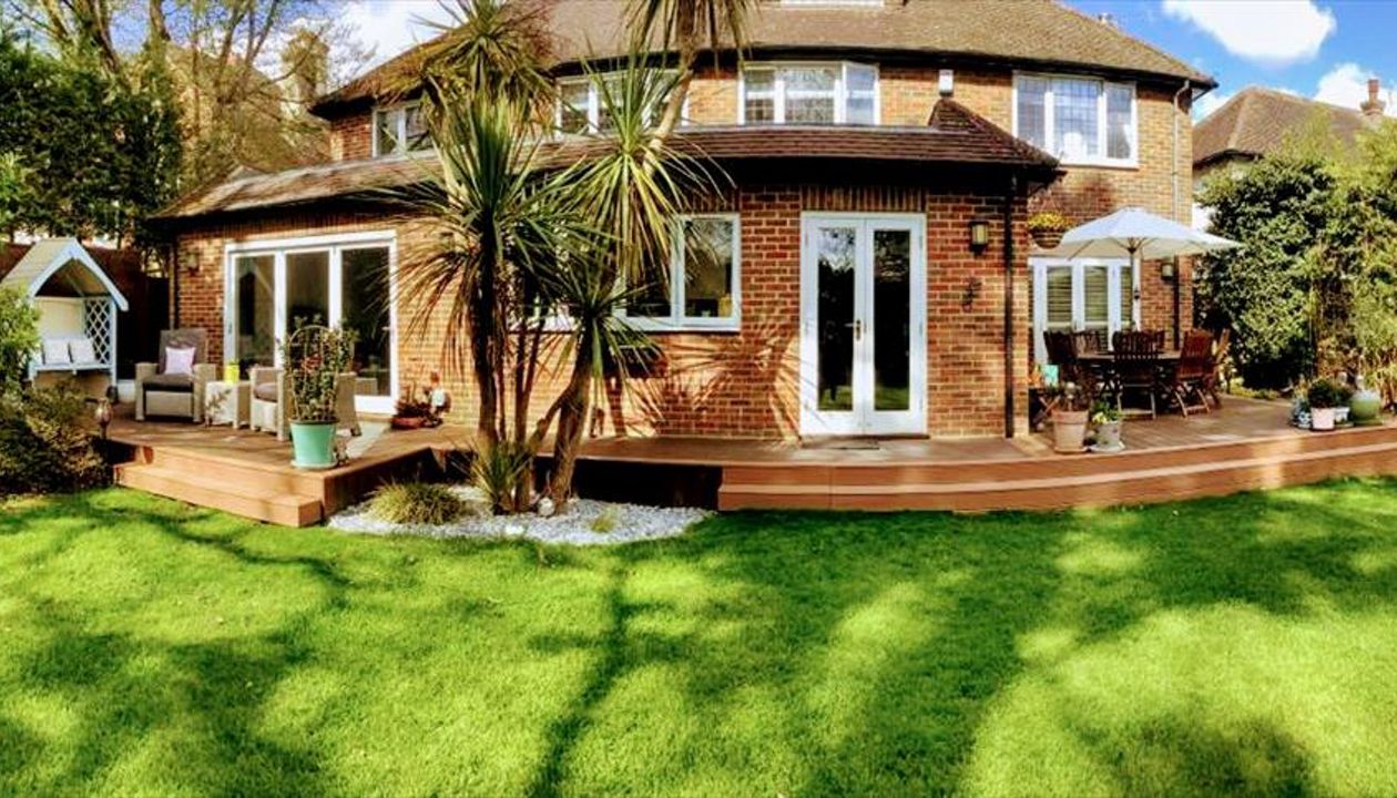 Trex Transcend Tiki Torch and Trex Transcend Spiced Rum Decking in Walton on Thames , England UK