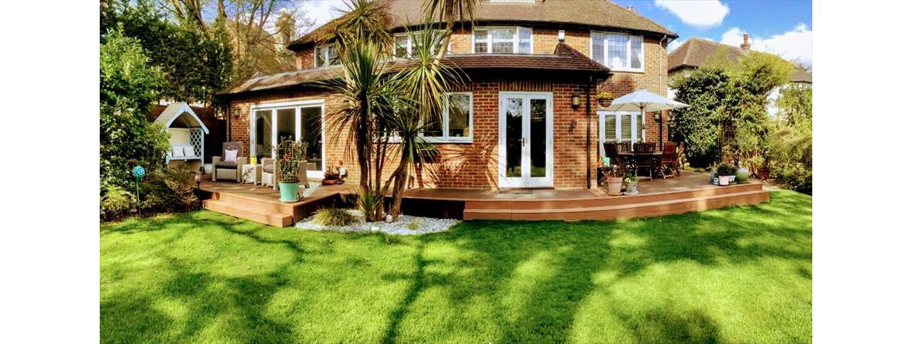 Trex Transcend Tiki Torch and Trex Transcend Spiced Rum Decking in Walton on Thames , England UK