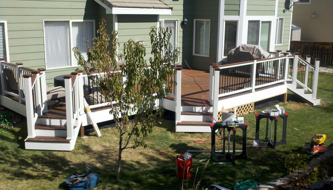 Trex Transcends Spiced Rum, White rails, Fascia, post sleeves, & black balusters