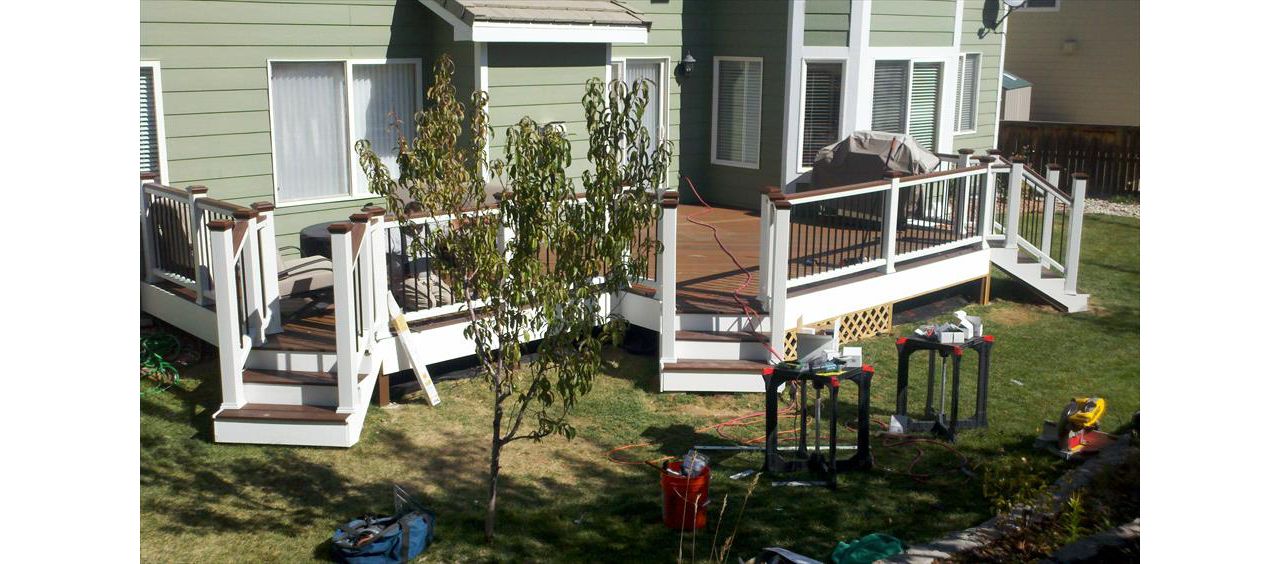 Trex Transcends Spiced Rum, White rails, Fascia, post sleeves, & black balusters