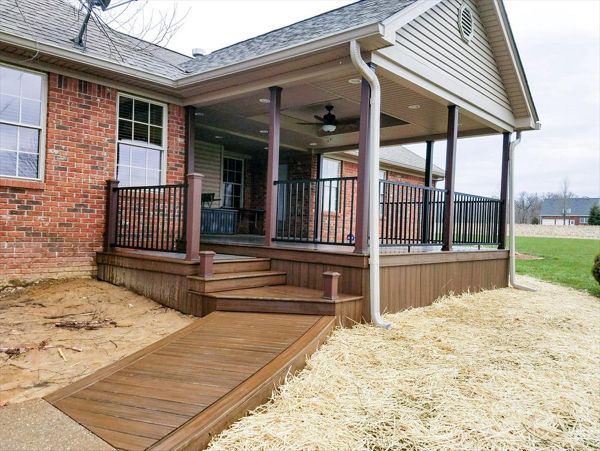 Trex Transcend Island Mist w/ Spiced Rum border and steps. Trex Signature Aluminum black railing w/ Vintage Lantern post sleeves