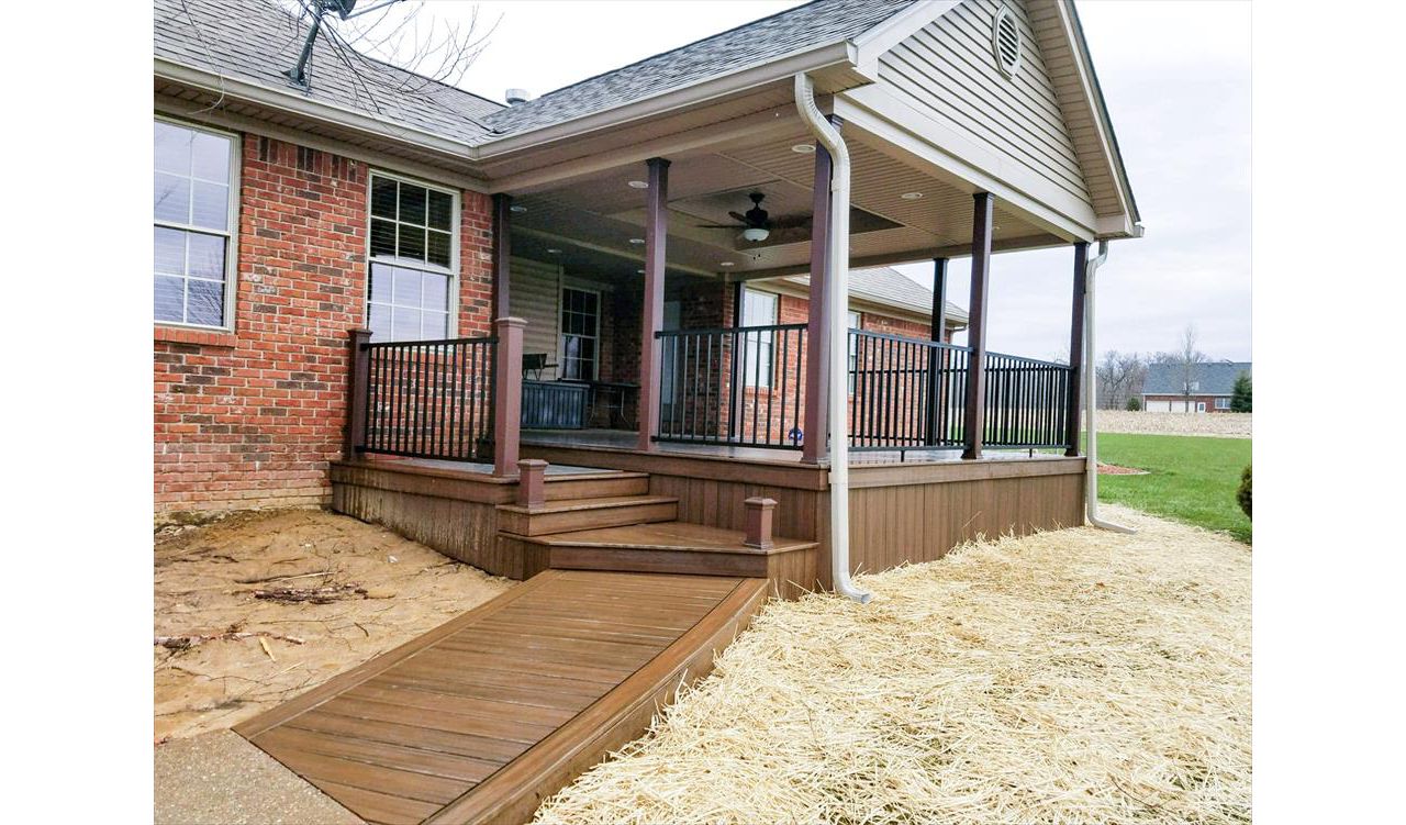 Trex Transcend Island Mist w/ Spiced Rum border and steps. Trex Signature Aluminum black railing w/ Vintage Lantern post sleeves