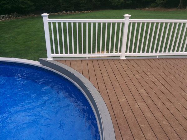 select saddle decking with pebble grey border, fascia and risers. vinyl rail