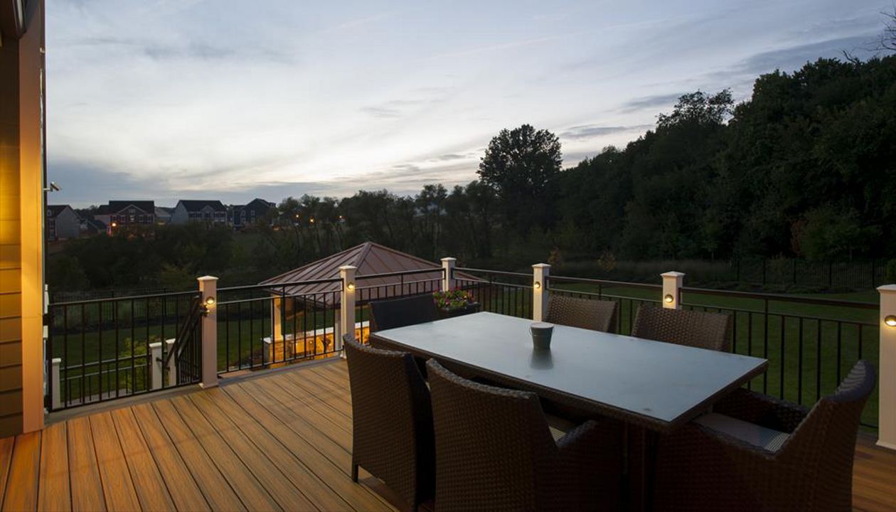 Trex deck boards with Trex deck lights at dusk