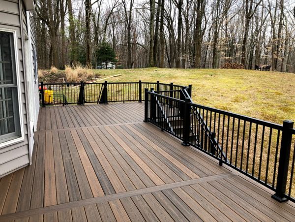 Trex Transcend Spiced Rum Composite Deck Boards with Black Aluminum Railing in Crownsville, MD