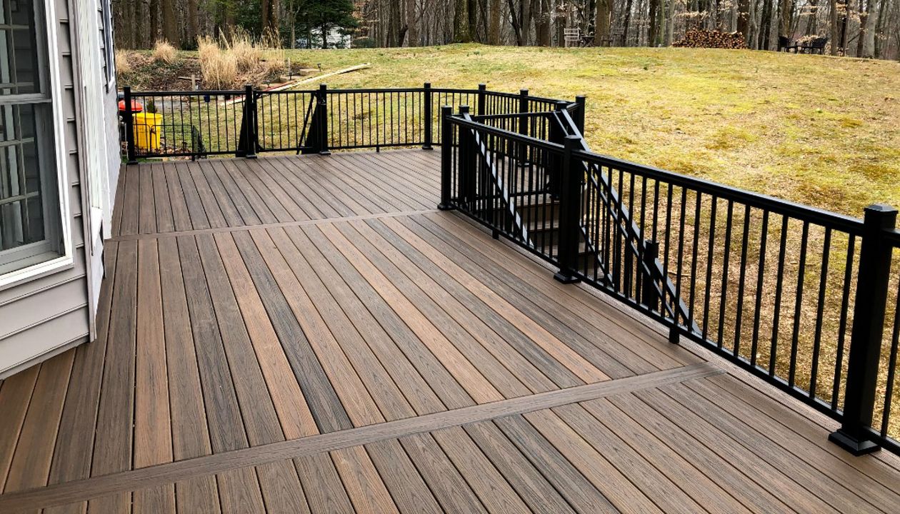 Trex Transcend Spiced Rum Composite Deck Boards with Black Aluminum Railing in Crownsville, MD