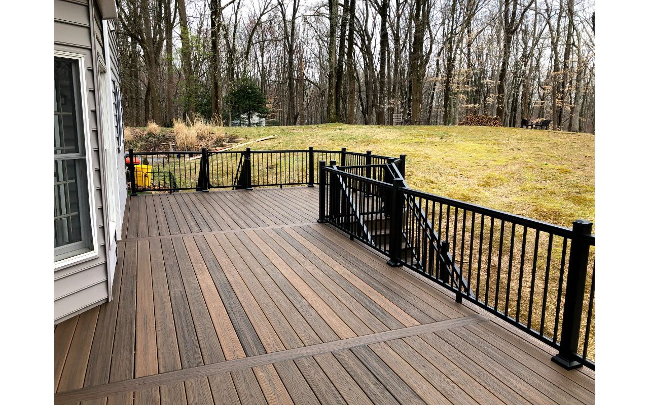 Trex Transcend Spiced Rum Composite Deck Boards with Black Aluminum Railing in Crownsville, MD