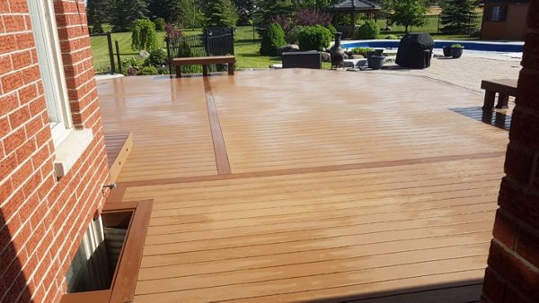 Main: Trex Enhance Basics in Beach Dune. Trim: Trex Enhance Basics in Saddle. Contact Align Decking today for your custom composite decking needs. Servicing Durham Region, Kawartha Lakes, and the Barrie & Orillia areas.