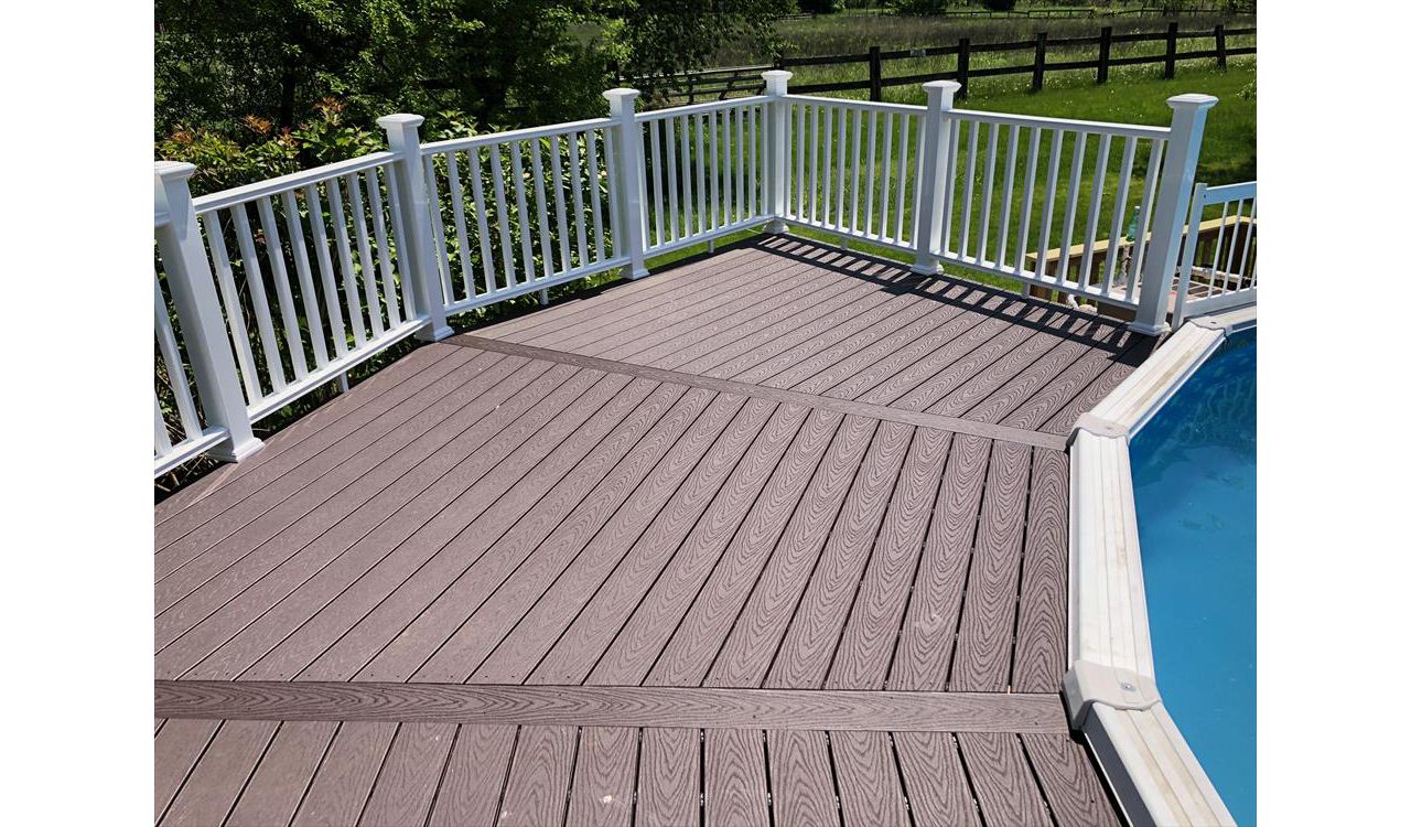 Semi-wrap around pool deck with Trex Vintage Lantern decking.